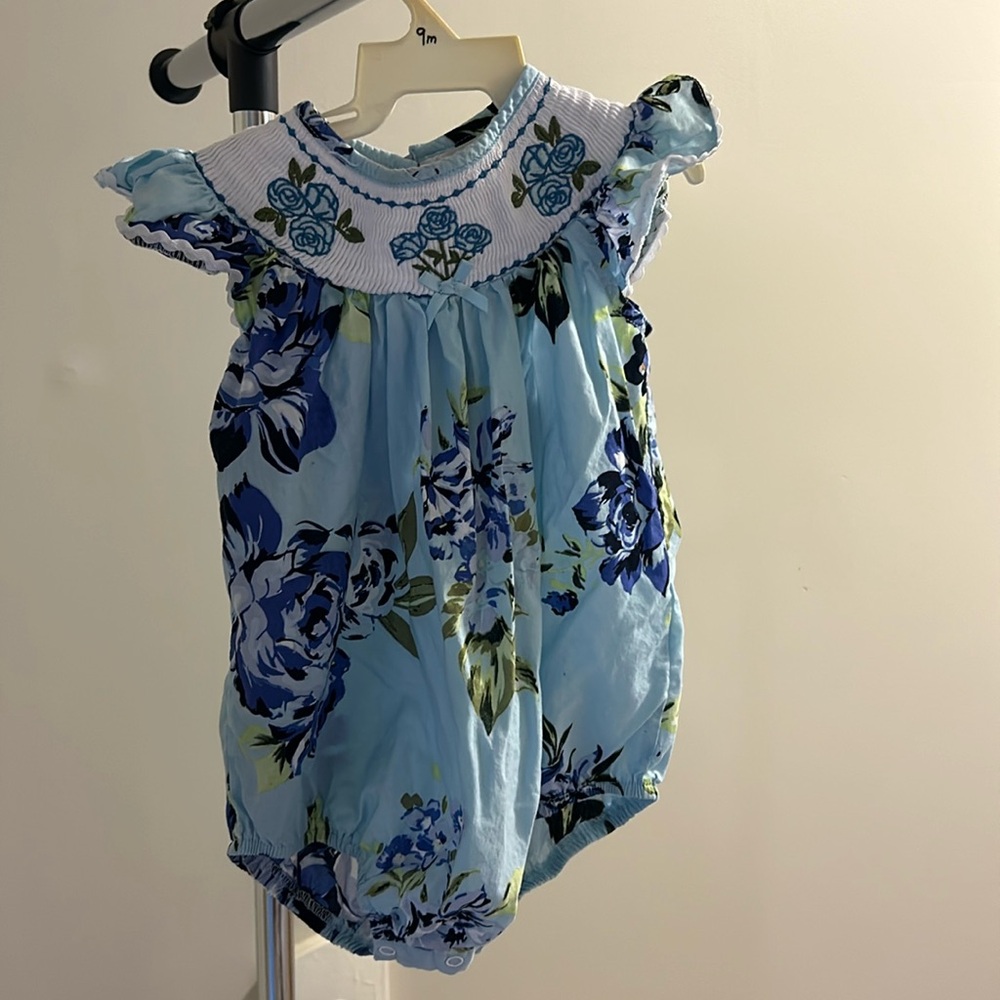Little Cactus 12-18 bubble romper— blue flowers (Texas bluebonnet?) smocked